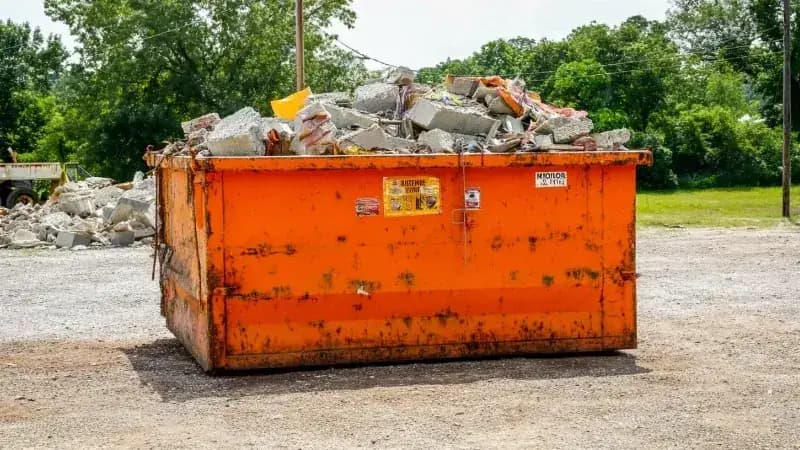 Dumpster Weight Limits & Overage Fees: Complete 2025 Guide